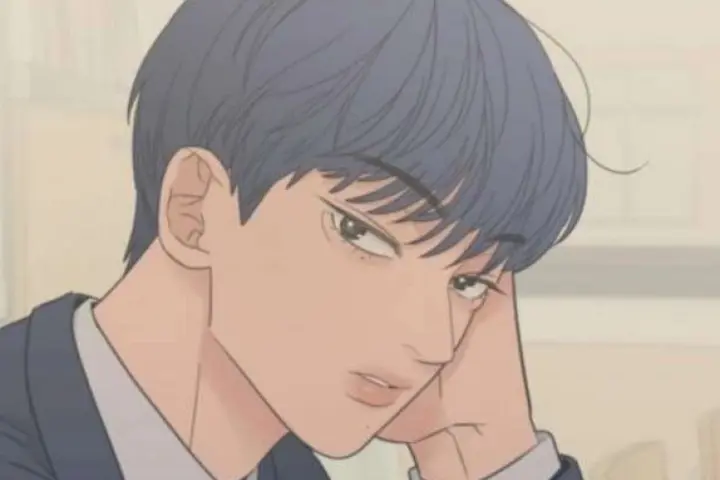 A thoughtful young male character from What Kind of Rice Cake Is This Chapter 82, showing emotional expression as unexpected feelings deepen